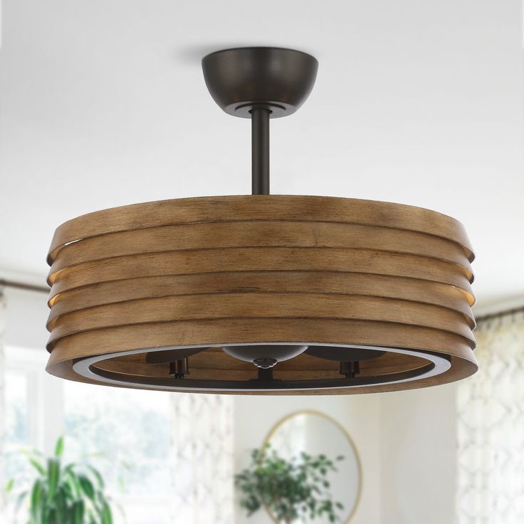 a wooden light fixture hanging from the ceiling