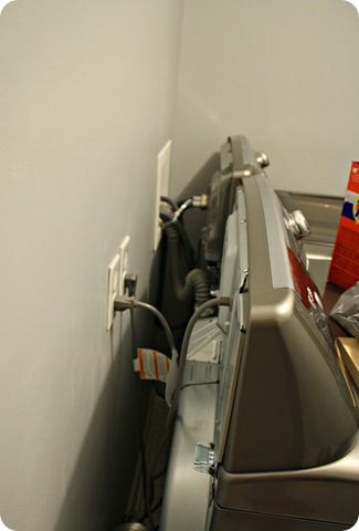 a silver refrigerator freezer sitting inside of a kitchen