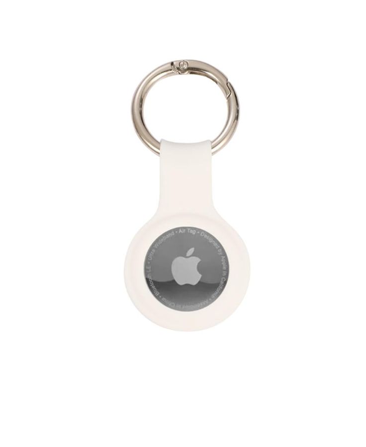 an apple keychain is shown with the apple logo on it's side