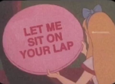 a cartoon character holding a pink bubble with the words let me sit on your lap