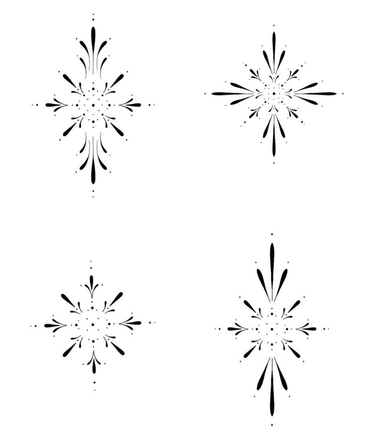 four black and white snowflakes on a white background