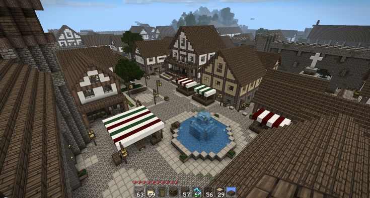 an aerial view of a small town in minecraft