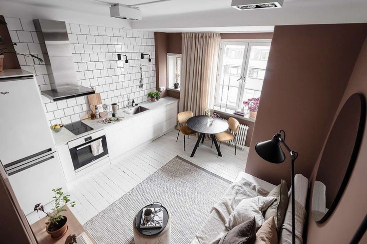 an aerial view of a kitchen and living room