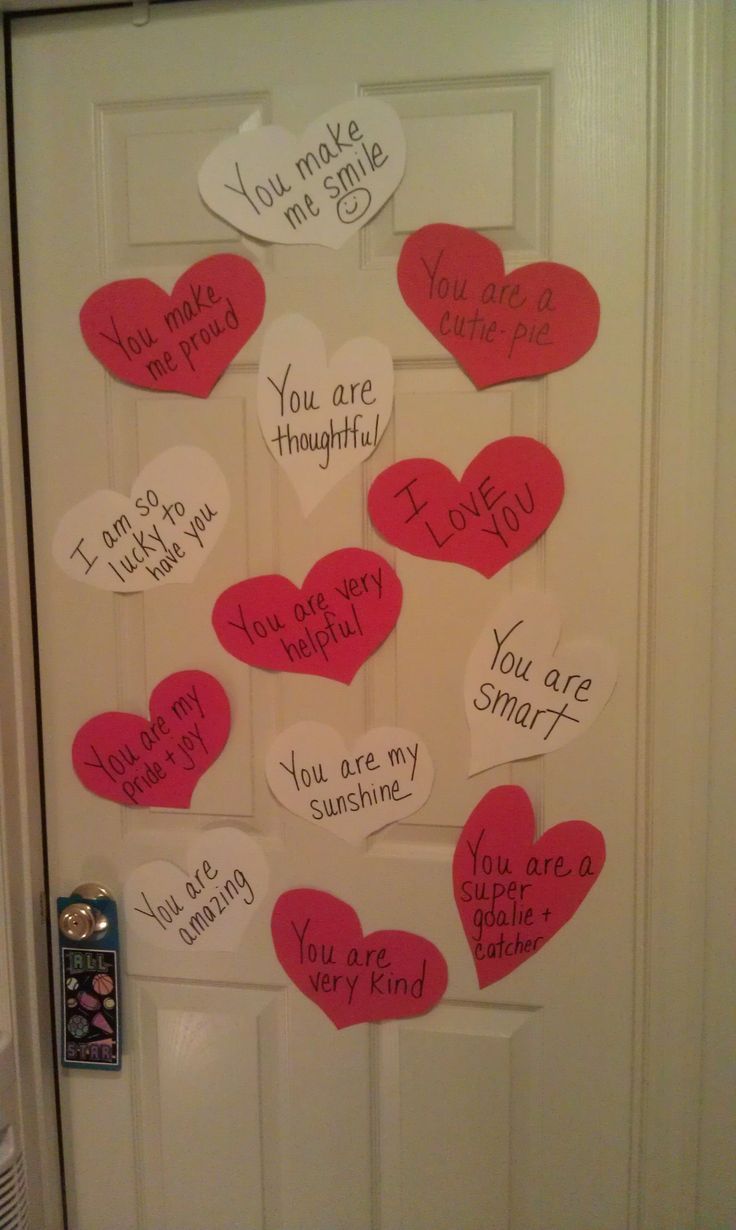 a door decorated with paper hearts that say you are my smile