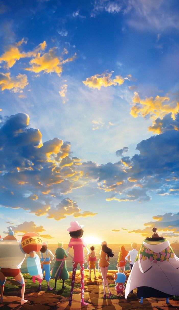 people standing in the middle of a field under a cloudy blue sky with sun shining through clouds