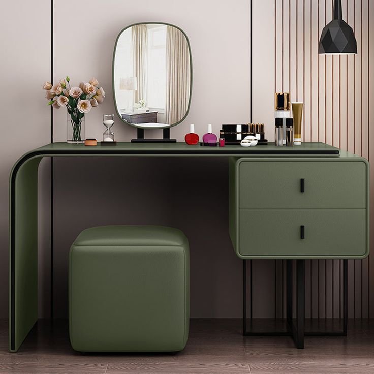 a dressing table with a mirror and stool