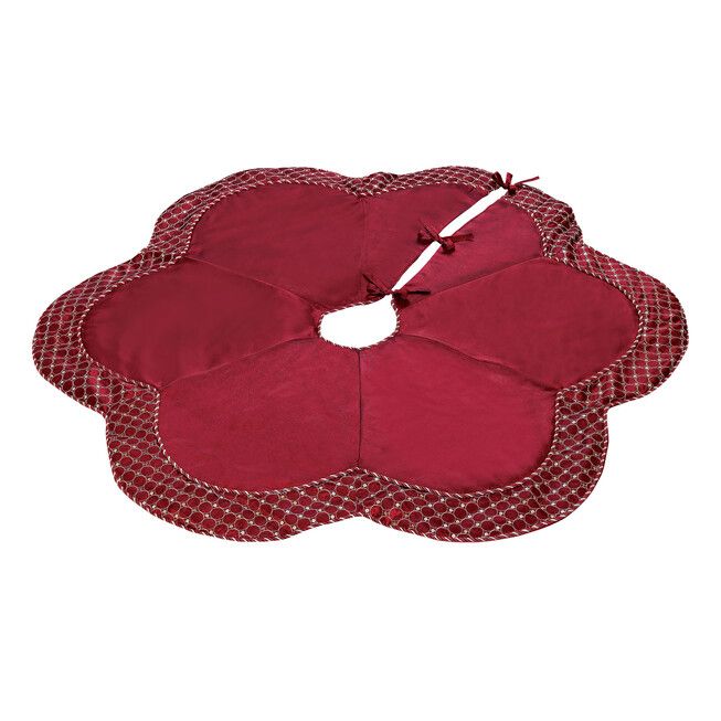 a red flower shaped cushion on top of a white background