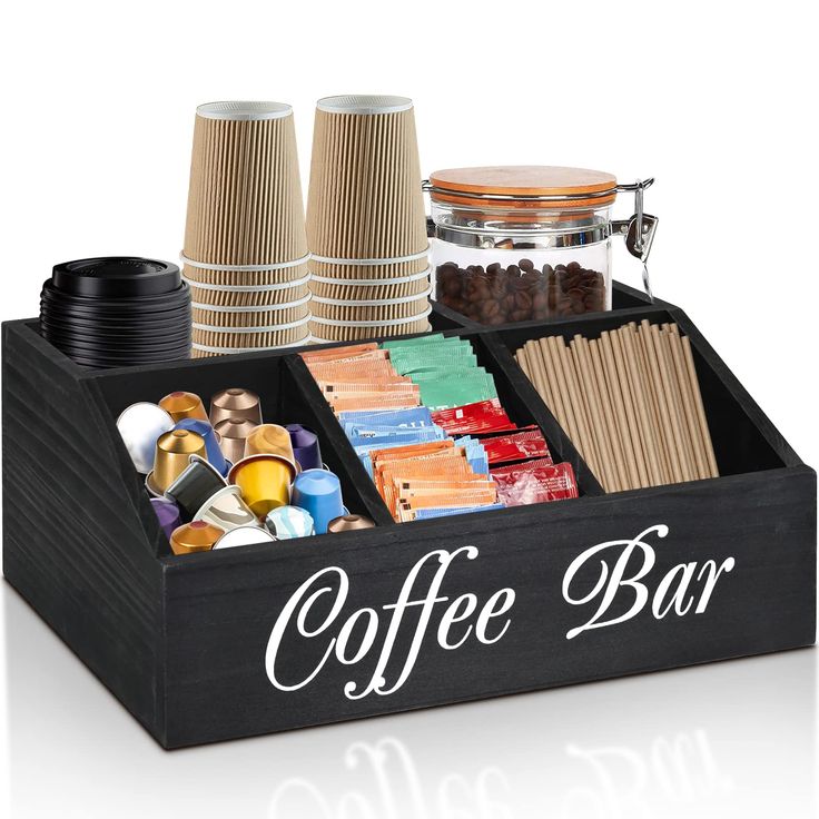 the coffee bar is organized with cups and other things to make it easier for someone to drink