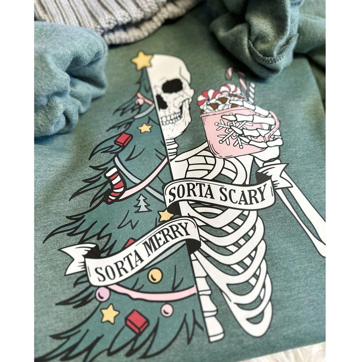 a skeleton is holding a christmas tree with the words soria scary on it's chest