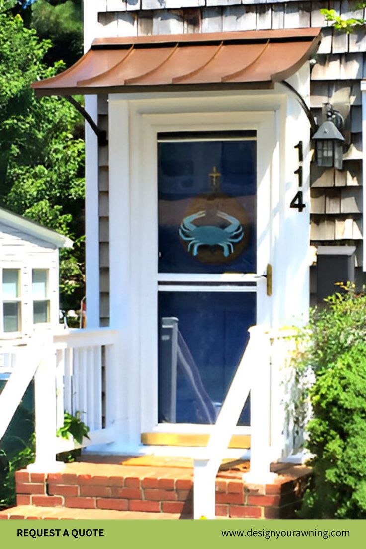 the front door of a house with a blue crab painted on it