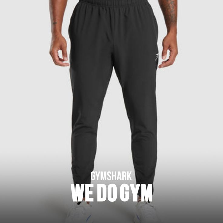 REDEFINING YOUR POTENTIAL Give some extra power, poise and purpose to your training. The Arrival Woven Joggers are focused on performance with a supportive fit, light-stretch polyester-elastane blend and customisable wear, keeping your movement weightless and your efforts effective. - Slim fit- Lightweight material- Tapered to leg- Elasticated drawcord waistband- Zipped ankle cuffs for easy wear- Open side pocket- Heat-sealed Gymshark logo to thigh- 87% Polyester, 13% Elastane- Model is 6'0" an… The Arrival, Ankle Cuffs, Side Pocket, Easy Wear, Heat, Slim Fit, How To Wear, Black