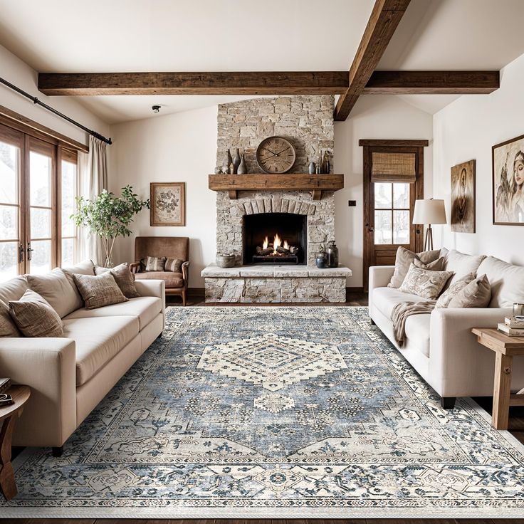 a living room filled with furniture and a fire place in the middle of a room