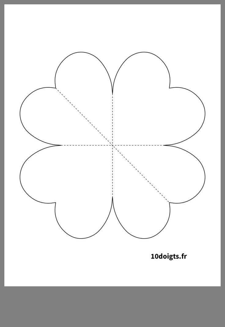 a four leaf clover cut out from the paper to make it look like an image