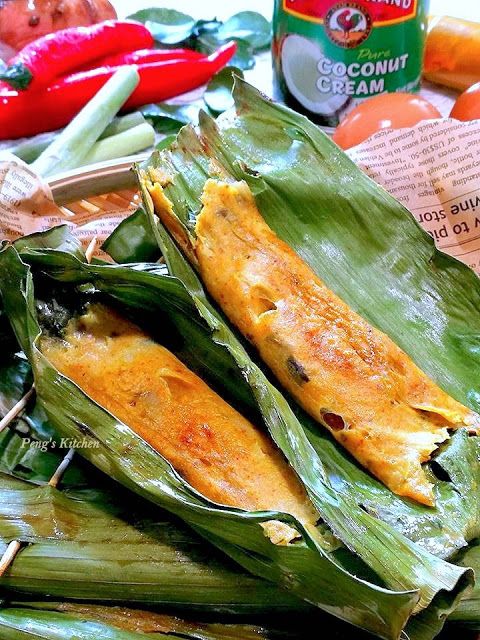 some corn on the cob with other vegetables and condiments