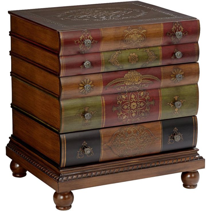 a wooden box with four different colored boxes on it's sides and an intricately decorated lid