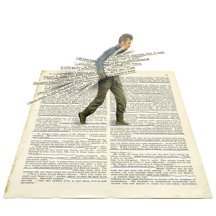 a man walking on top of an open book