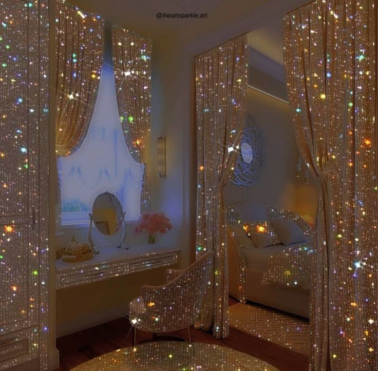 a bedroom decorated in gold and white with lights on the walls, windows, and curtains