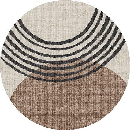 a round rug with black and white stripes on it's center circle, in front of a beige background