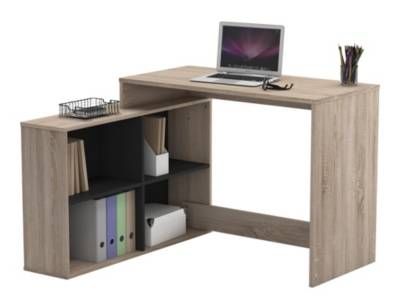 a laptop computer sitting on top of a desk next to a book case and binders