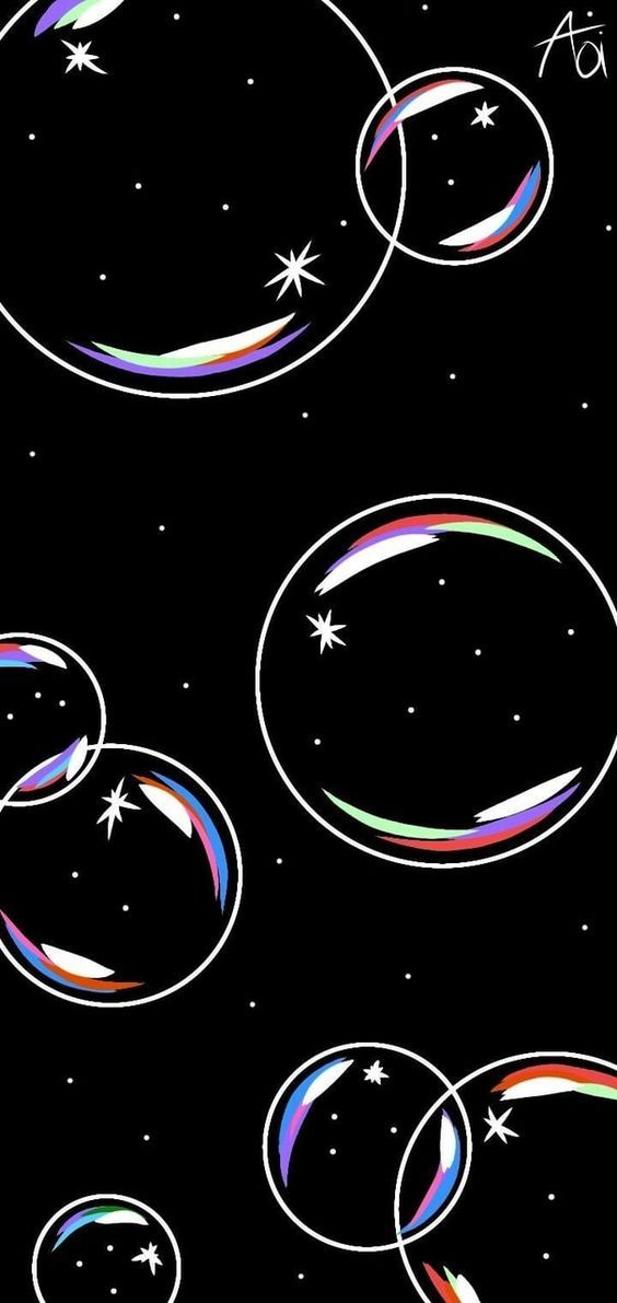 an image of colorful bubbles floating in the air with stars and circles around them on a black background