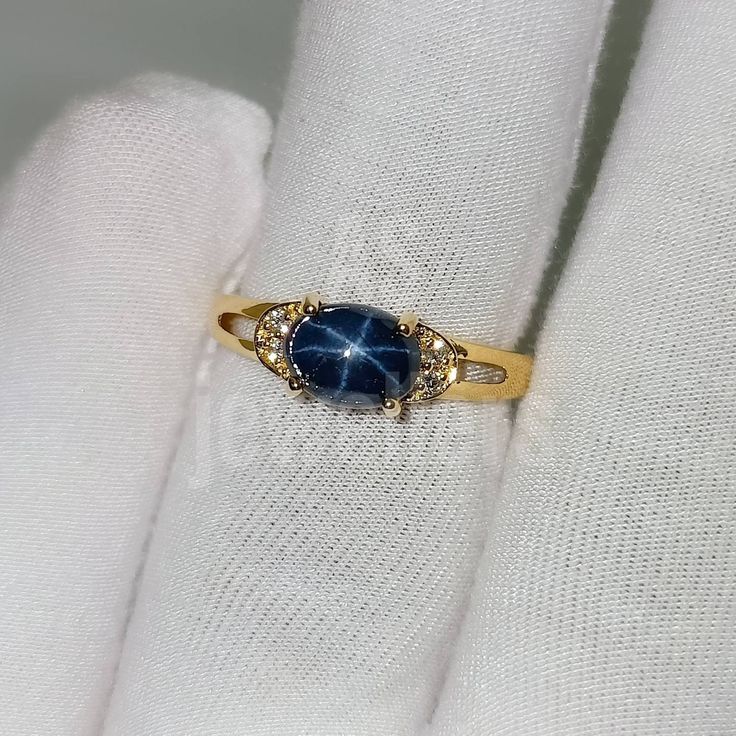 BAND- AS JEWELLERS GEMSTONE- 100% NATURAL STAR BLUE SAPPHIRE SAPPHIRE STONE SIZE -5X7MM SAPPHIRE WEIGHT - 1.90CT STONE SHAPE- OVAL GEM COLOUR - BLUE SECONDARY STONE - Natural DIAMOND PLEASE GIVE YOUR OPENION OR FEEDBACK ABOUT THE PRODUCT. WE ACCEPT BULK ORDER ALSO. THANK YOU Colorful Sapphire Ring, Starburst Sapphire Ring, Star Saphire Ring, Gold Sapphire Ring Star, Blue Star Ring, Sapphire Pearl Ring, Dainty Sapphire Ring, Star Shaped Sapphire Jewelry For Anniversary, Star-shaped Sapphire Rings For Anniversary