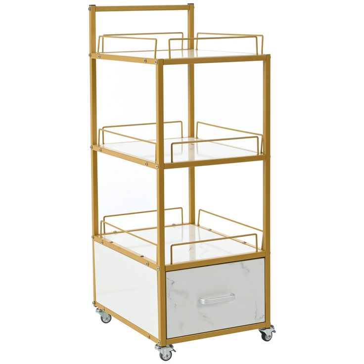 a gold and white cart with drawers on wheels