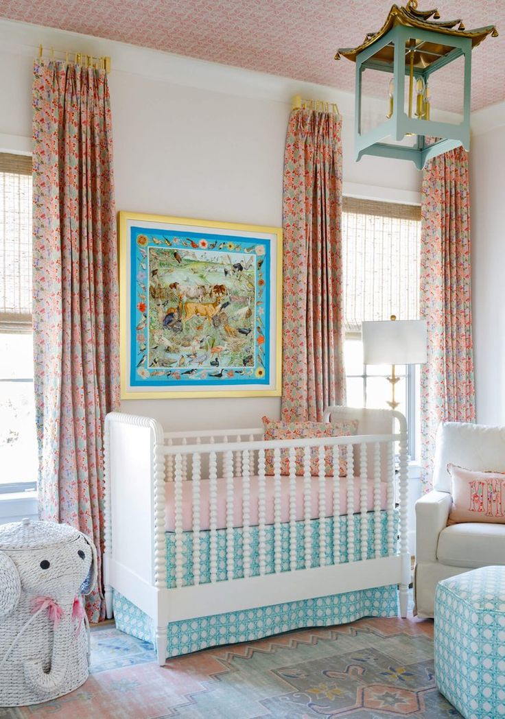 the baby's room is decorated in pink and blue