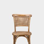 a wooden chair with wicker back and seat