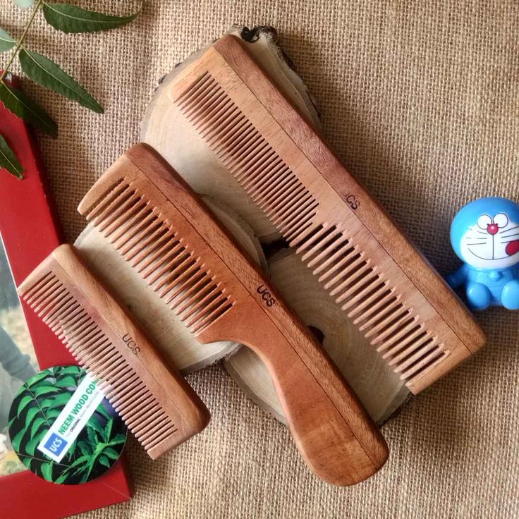 Wish to comb your hair for life? If YES, then switch to UCS Neem Wood Comb! Made from the wood of Indian Neem (Azadirachta Indica) tree, UCS Neem Wood Combs have proven medicinal properties that controls hair loss, treats dandruff and keep scalp disease free. Suitable for men and women of all age groups, UCS Neem Wood Hair Combs are non-invasive and you can use them like any other hair comb. Detangling Comb, Beard Products, Static Hair, Wood Comb, Tail Comb, Hair Cleanser, Wooden Spatula, Gift Sets For Her, Comb Set