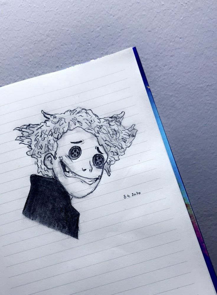 a drawing of a person with curly hair and an evil look on their face, in a notebook