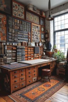 an old fashioned office with lots of books on the walls and desks in front of large windows