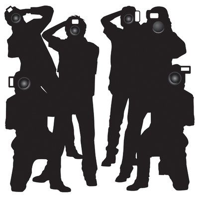 the silhouettes of three people are taking pictures with their camera phones in front of them