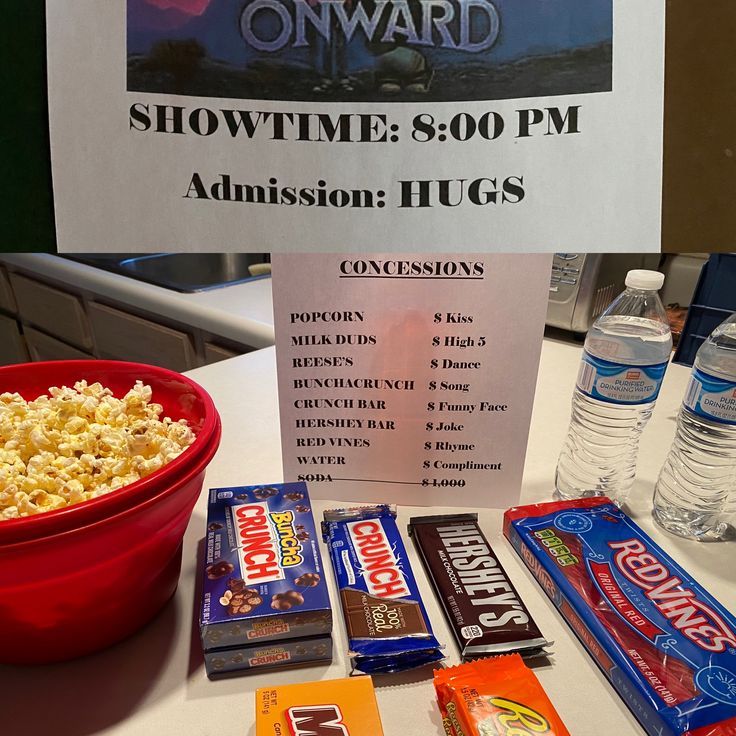 a table topped with candy and snacks next to a sign that says show time $ 30 00 pm