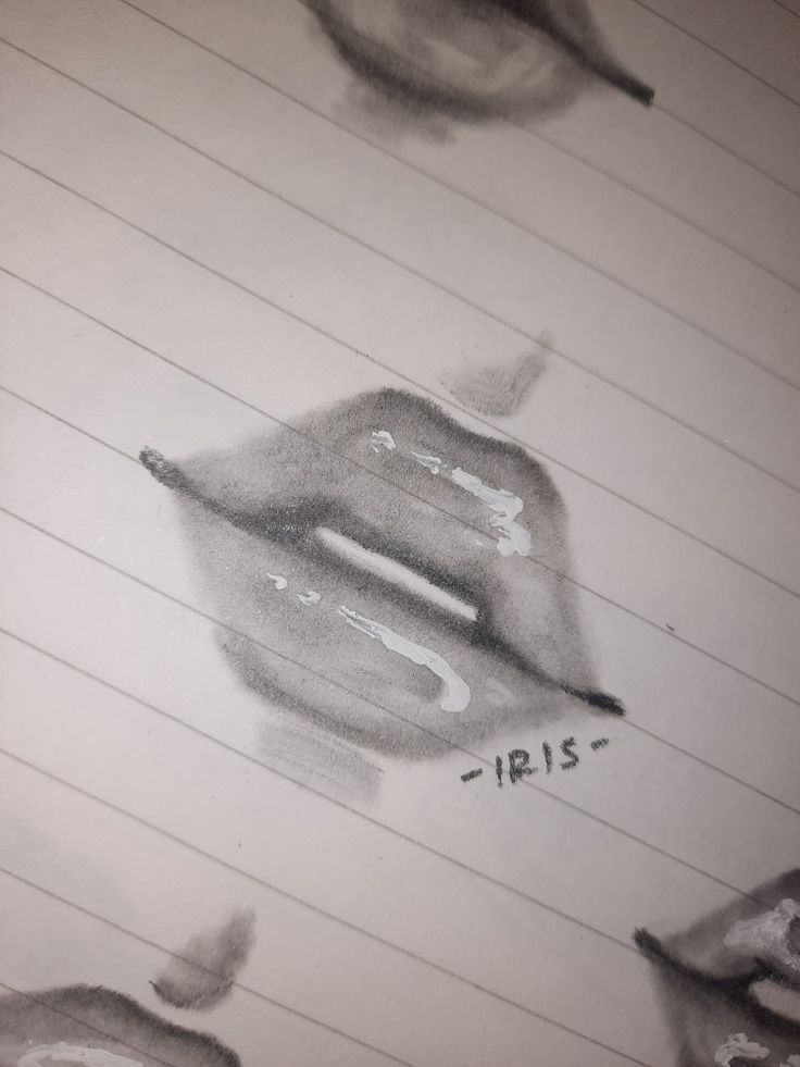 a pencil drawing of a person's hand with the word iris written on it