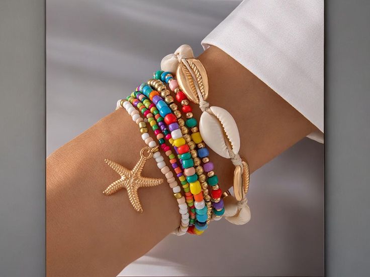 🌊 Get ready to shine under the sun with this 7-piece Boho Starfish Bracelet Set! Perfect for beach days, summer vibes, and festival fun. 🏖️ Each bracelet is designed with beautiful shells, rice beads, and a touch of bohemian spirit to bring out the free-spirited you! ✨ Elastic and easy to wear, they're perfect for stacking or mixing and matching with your fave outfits. Whether you're walking along the shore or hanging out with friends, these bracelets will add that extra pop of beachy chic to Cheap Summer Beaded Bracelets For Vacation, Colorful Beaded Bracelets For Beach - Affordable, Beachy Bracelets, Beachy Chic, Starfish Bracelet, Rice Bead, Beach Jewelry, Free Spirit, Bracelet Stack