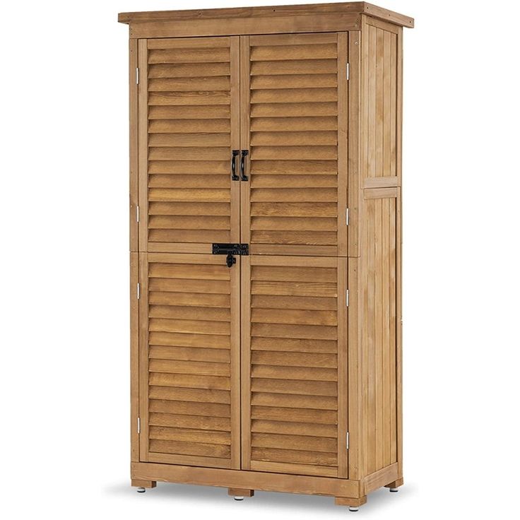 a tall wooden cabinet with shutters on the front and bottom doors, sitting against a white background