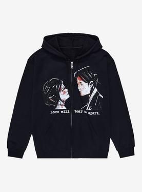 a black hoodie with an image of two people on the front and one in the back