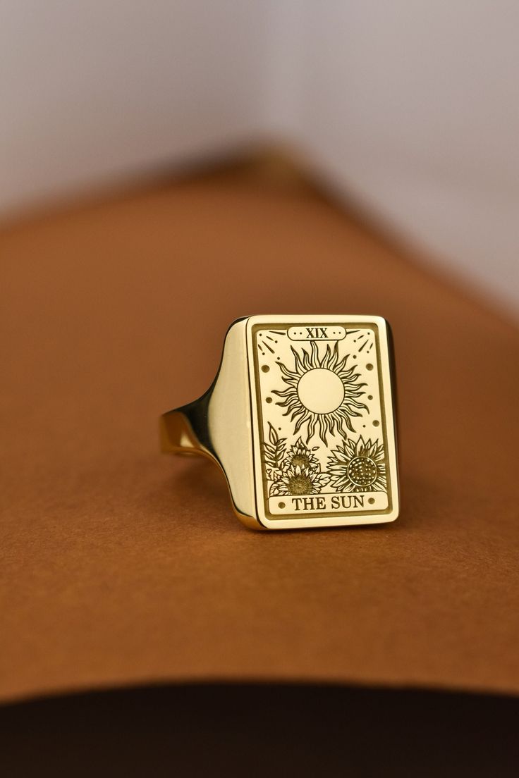 Welcome to LUXJ, Here you will find a beautiful selection of rectangle signet rings with a variety of designs such as our sun tarot card signet ring. Our team is happy to assist you with any questions you may have and we look forward to creating these special jewelry for you. *The images are taken from us and you will receive your ring as shown* | Information about the ring | - Face Size: 16x12mm - Band width at the bottom: 3mm | Material | - Sterling Silver 925 - Gold Vermail (925 base) - 9K Re Sun Signet Ring, Adjustable Rectangular Signet Ring As Gift, Adjustable Rectangular Signet Ring Gift, Handmade Rectangular Signet Ring For Gift, Tarot The Sun, Silver Signet Rings, Card Ring, Sun Tarot Card, The Sun Tarot Card