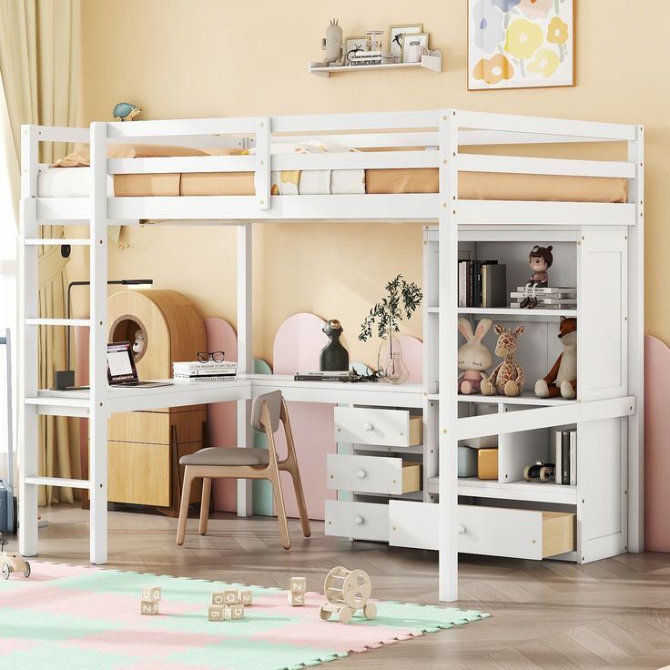 a white bunk bed sitting next to a desk and chair