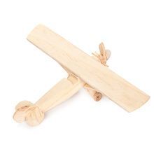 a wooden toy airplane on a white background