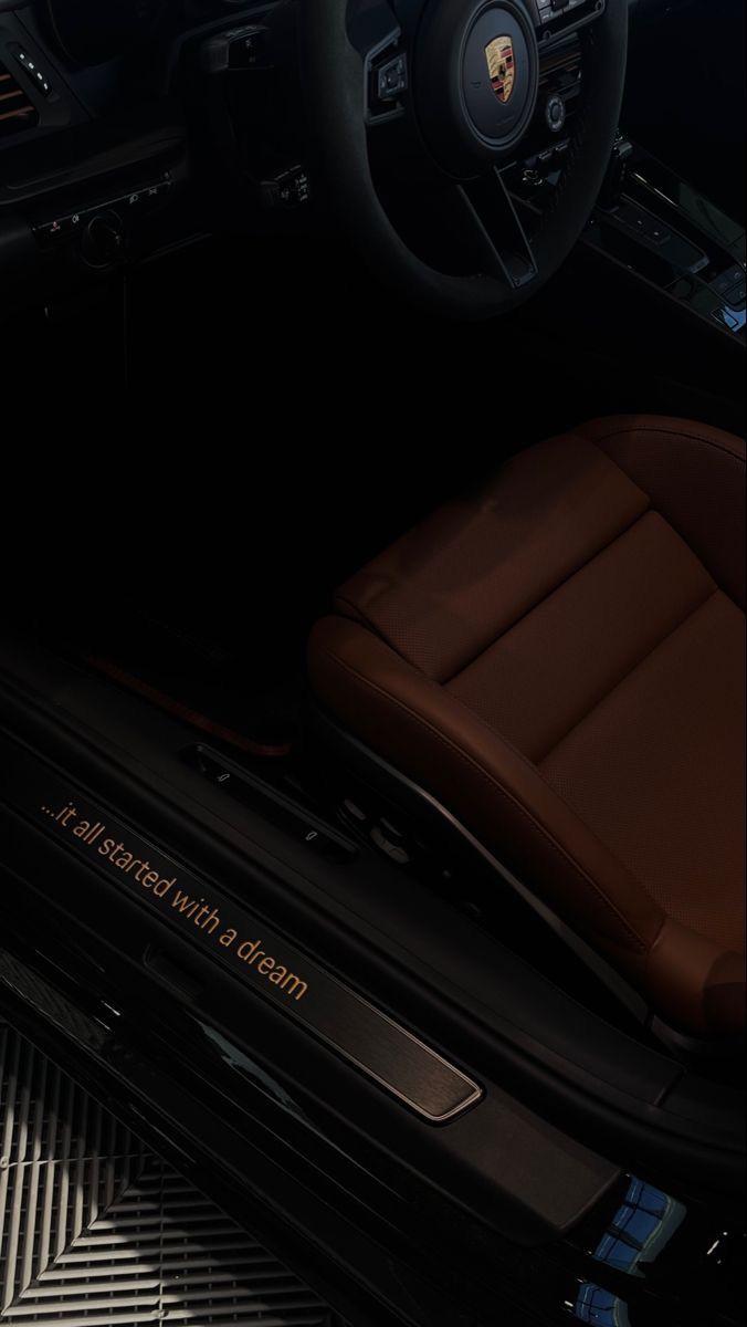 the interior of a car with brown leather seats