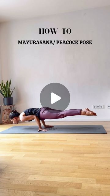 a woman doing a yoga pose in front of a wall with the words how to