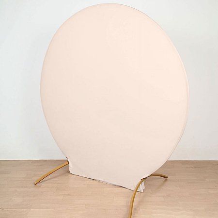 a large white balloon sitting on top of a wooden floor