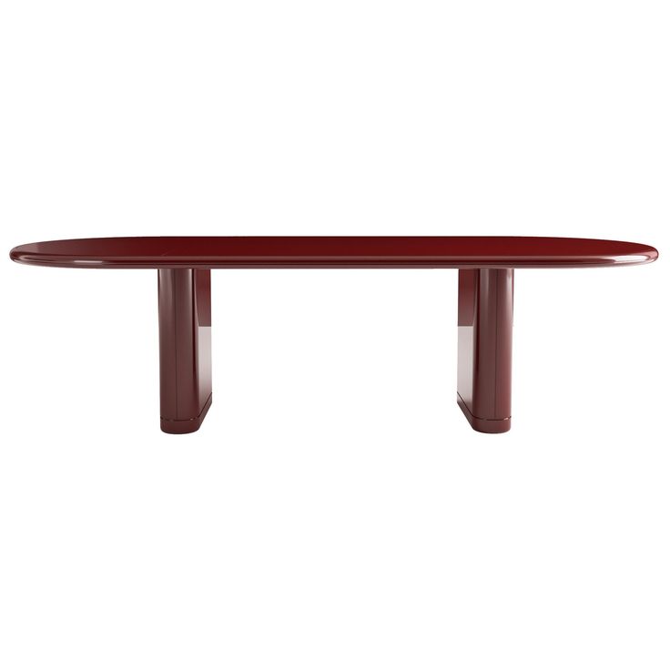 a red table sitting on top of a white floor