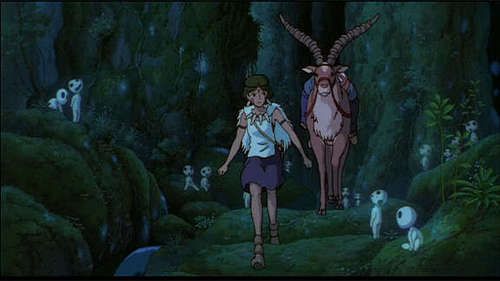 a woman is walking through the woods with an animal on her back and other animals in the background