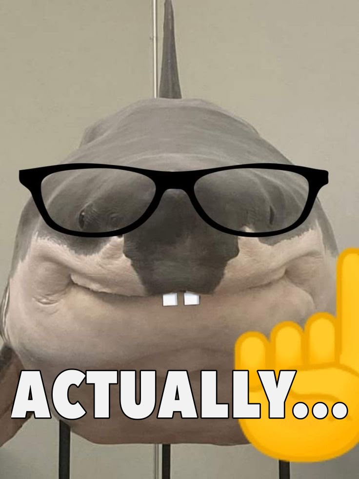 a fake shark wearing glasses with the words actually above it