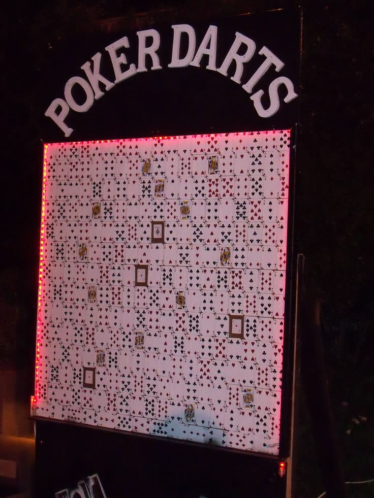 there is a sign that says poker darts on it