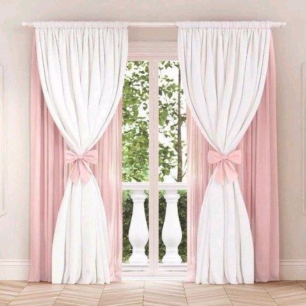 pink and white curtains with bows on them