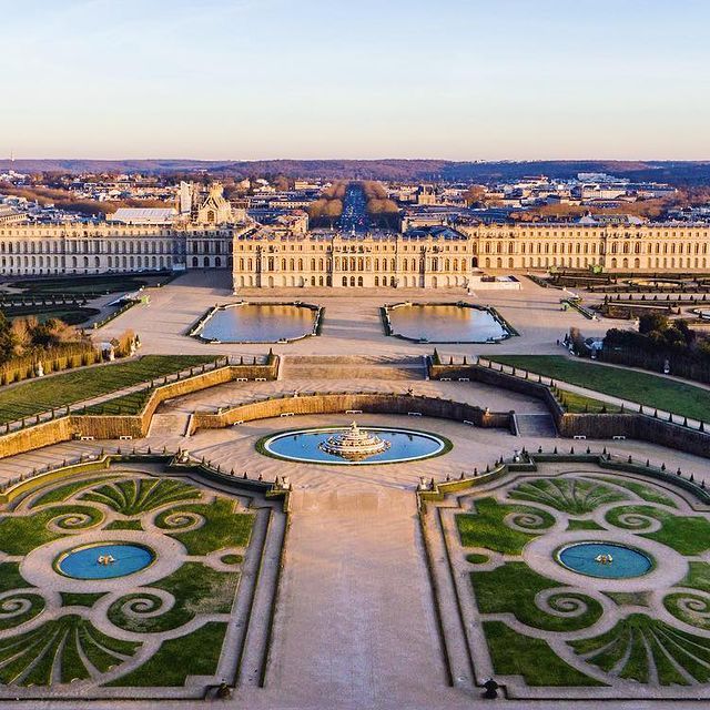 an aerial view of the palace and gardens