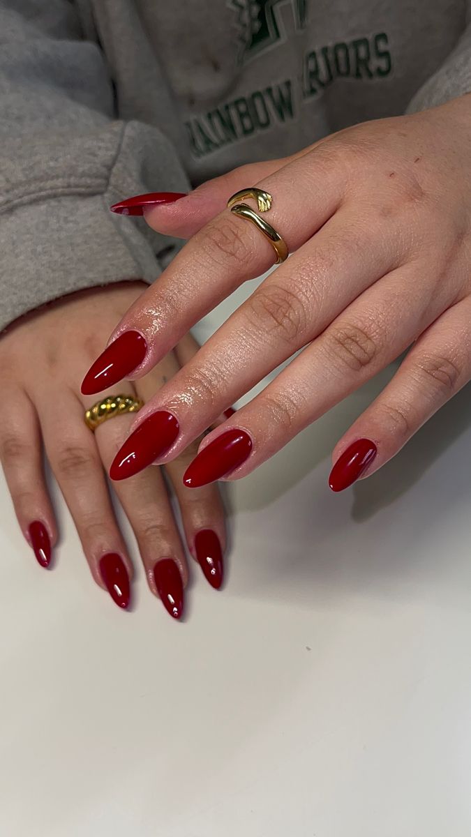 All Red Almond Nails, Medium Almond Christmas Nails, Red Almond Nails With Design, Christmas Nails Red Almond, Long Almond Red Nails, Long Almond Christmas Nails, Red Long Almond Nails, Red Almond Shape Nails, Long Red Almond Nails